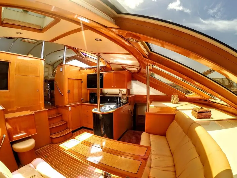 Slide: The Image of Interior of Jutson 46 LRC yacht, 2000, featuring luxurious wood finish. - 44