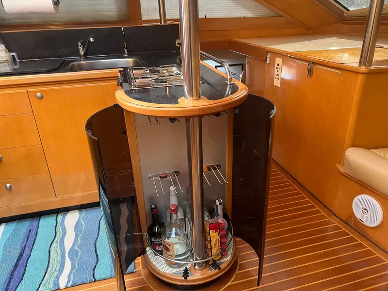 Slide: The Image of Interior of Jutson 46 LRC yacht, kitchen with bar area, year 2000. - 47