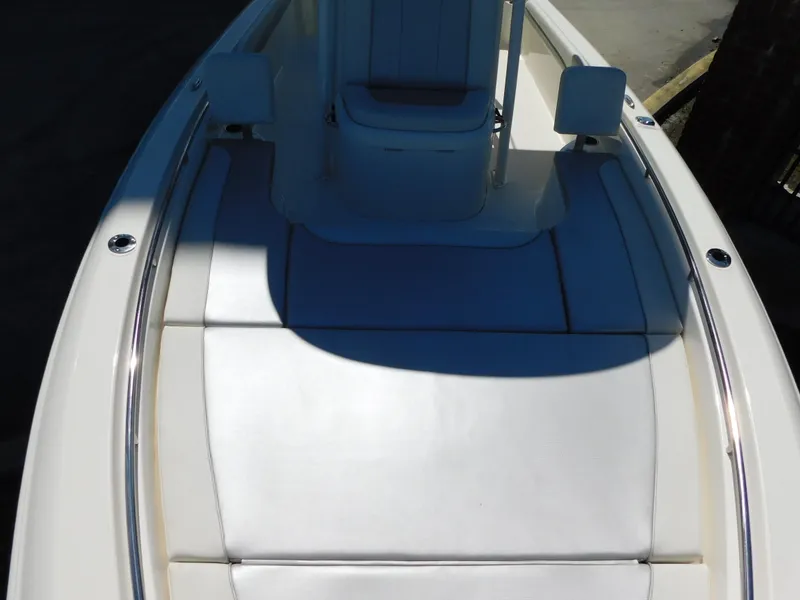 Slide: The Image of 2022 ShearWater 250 XTE boat deck with cushioned seating. - 19