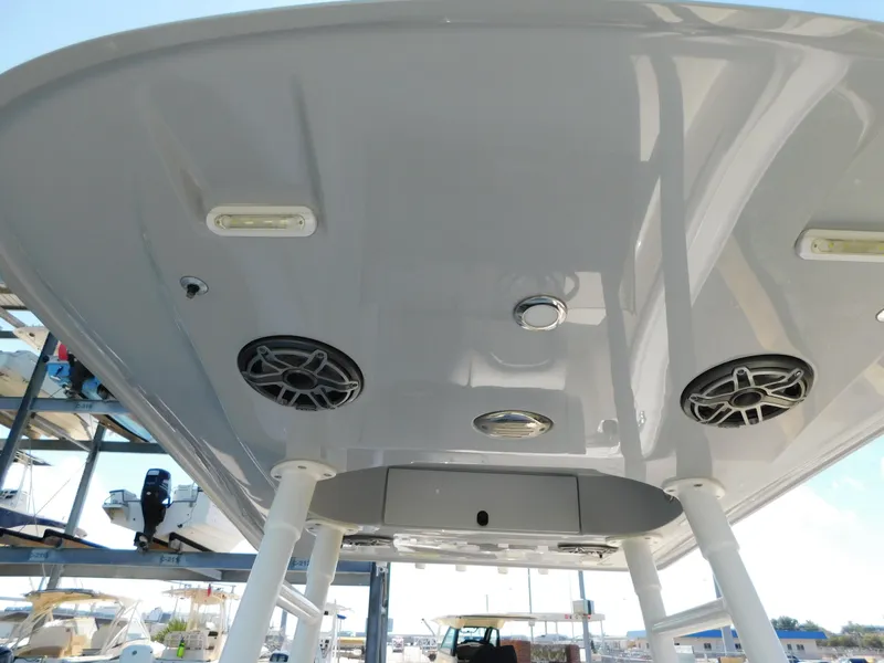 Slide: The Image of 2022 ShearWater 250 XTE boat canopy with speakers and lights. - 28