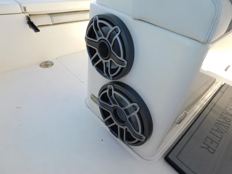 Slide: The Image of ShearWater 250 XTE 2022 boat speakers on white deck. - 29