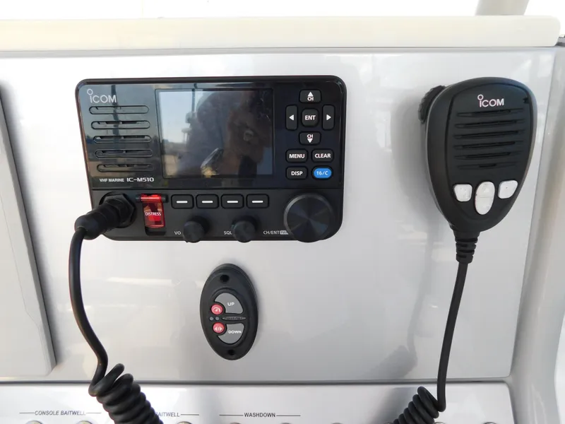 Slide: The Image of ICOM marine radio system on 2022 ShearWater 250 XTE boat dashboard. - 30