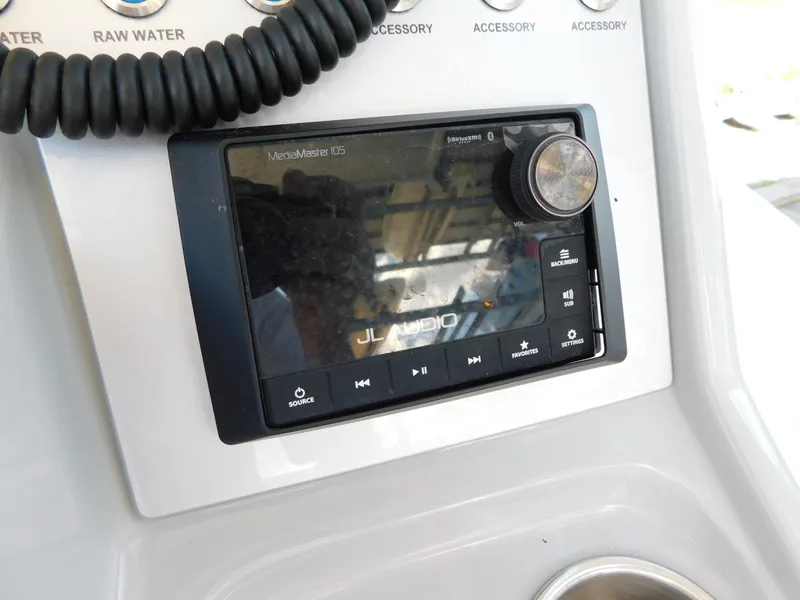 Slide: The Image of JL Audio system on 2022 ShearWater 250 XTE boat dashboard. - 32
