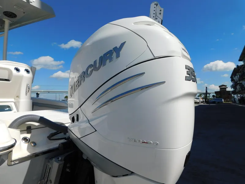 Slide: The Image of 2022 ShearWater 250 XTE with Mercury 350 outboard engine, clear sky background. - 39