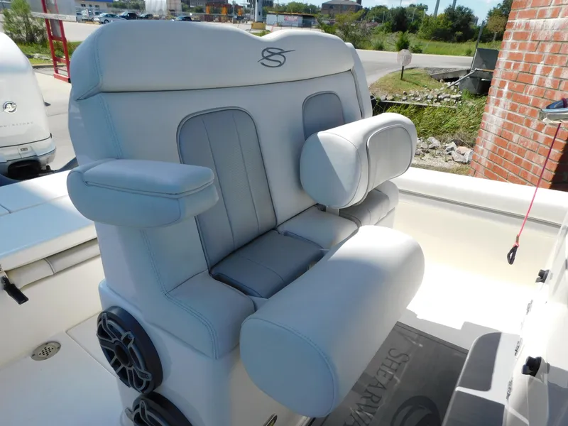 Slide: The Image of 2022 ShearWater 250 XTE boat seat with armrests and speakers. - 8