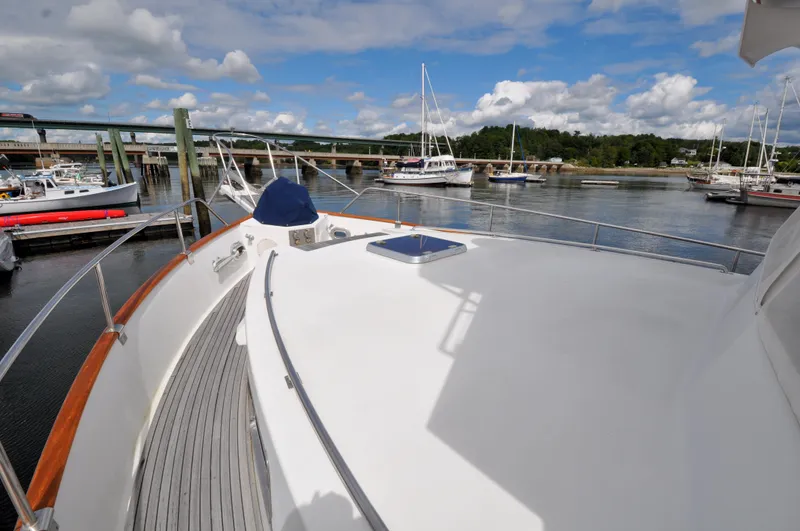 Slide: The Image of Grand Banks Heritage Europa 52 yacht docked at a marina, 2000 model. - 12