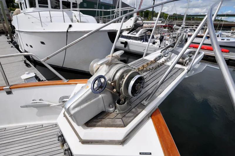 Slide: The Image of Grand Banks Heritage Europa 52 yacht bow with anchor winch, docked at marina, 2000 model. - 14