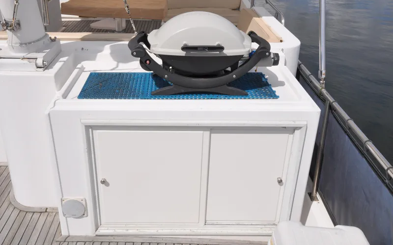 Slide: The Image of Outdoor grill on a 2000 Grand Banks Heritage Europa 52 yacht deck. - 23