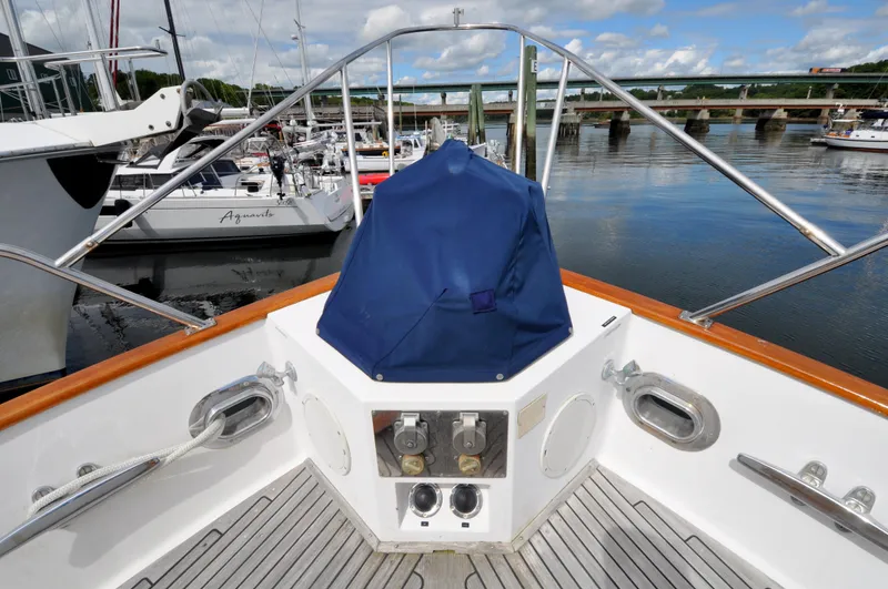 Slide: The Image of Bow view of 2000 Grand Banks Heritage Europa 52 yacht at marina. - 13