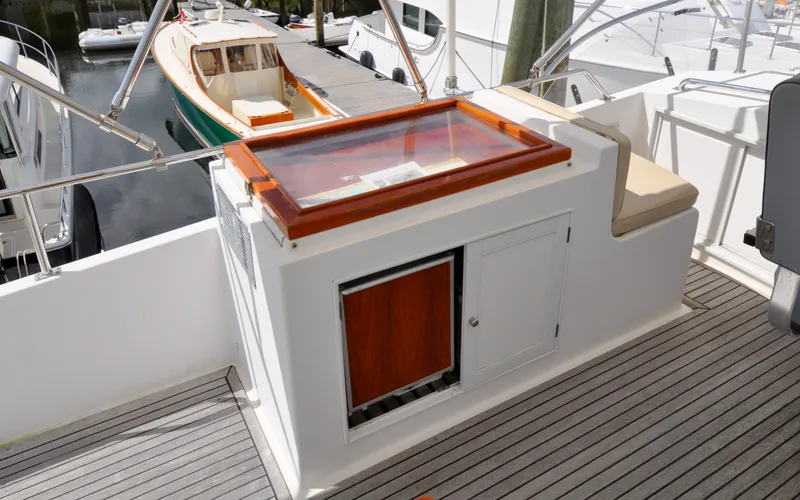 Slide: The Image of Grand Banks Heritage Europa 52 yacht deck with seating and storage, 2000 model. - 27