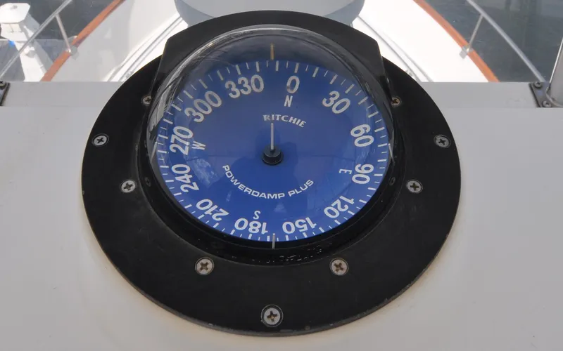 Slide: The Image of Compass on 2000 Grand Banks Heritage Europa 52 yacht, displaying cardinal directions. - 30