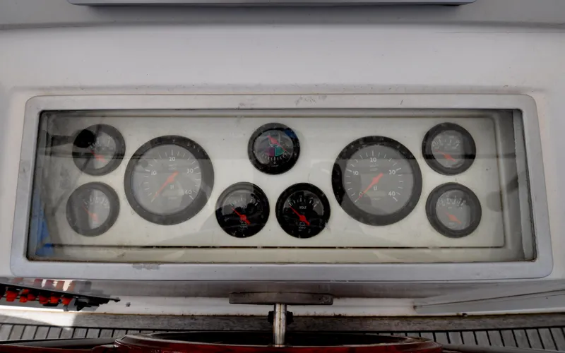 Slide: The Image of Instrument panel of 2000 Grand Banks Heritage Europa 52 yacht with multiple gauges. - 35