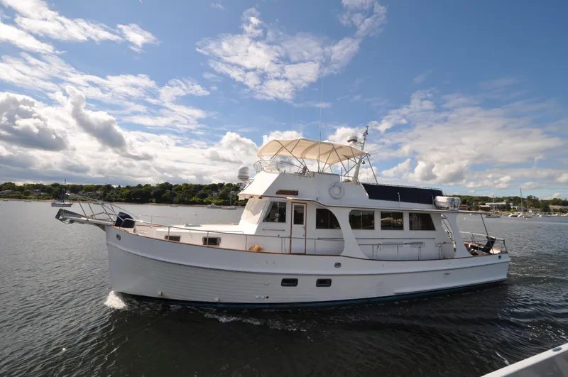 Slide: The Image of Grand Banks Heritage Europa 52 yacht cruising on a sunny day, 2000 model. - 4