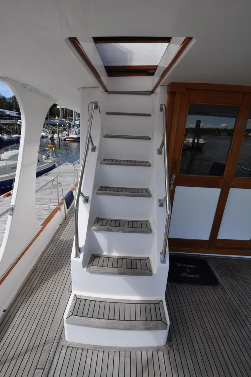 Slide: The Image of Staircase on 2000 Grand Banks Heritage Europa 52 yacht, leading to upper deck. - 8