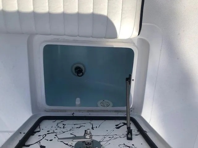 Slide: The Image of Open storage compartment in Piranha Alvo F1700 boat, 2025 model. - 10