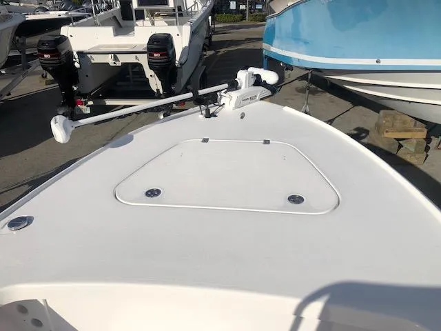 Slide: The Image of Piranha Alem F2000 boat 2022 with motors in the background. - 13