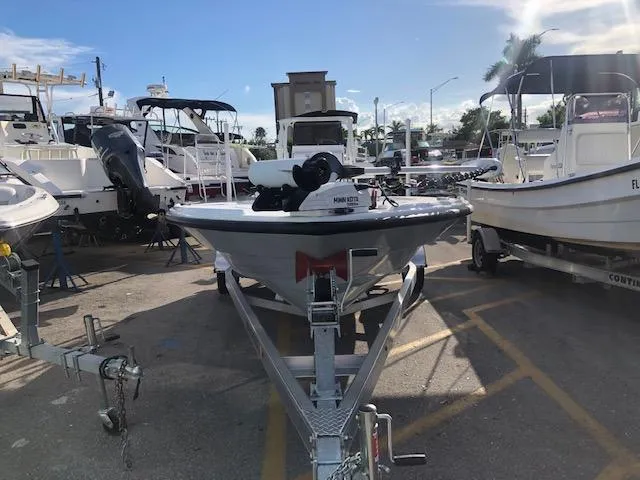 Slide: The Image of Piranha Alem F2000 boat, 2022 model, on a trailer outdoors. - 2