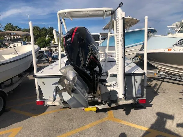 Slide: The Image of 2022 Piranha Alem F2000 boat with outboard motor in a parking lot. - 5