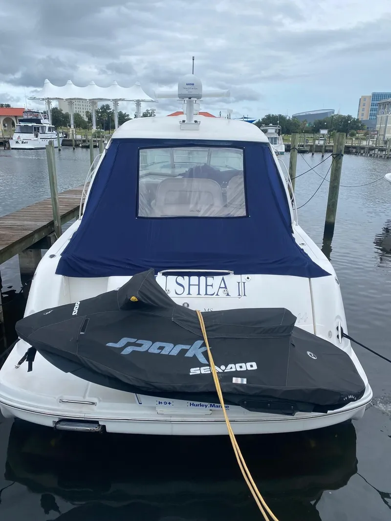 Slide: The Image of 2006 Sea Ray 44 Sundancer docked with Sea-Doo Spark jet ski on the swim platform. - 3