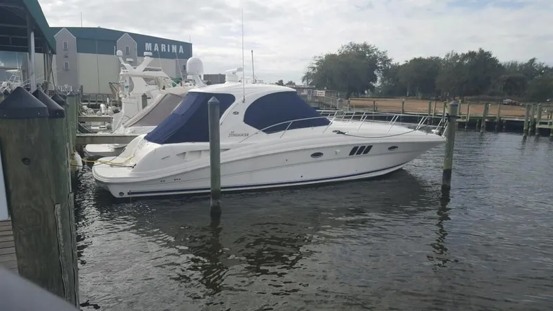Slide: The Image of 2006 Sea Ray 44 Sundancer yacht docked at marina. - 8