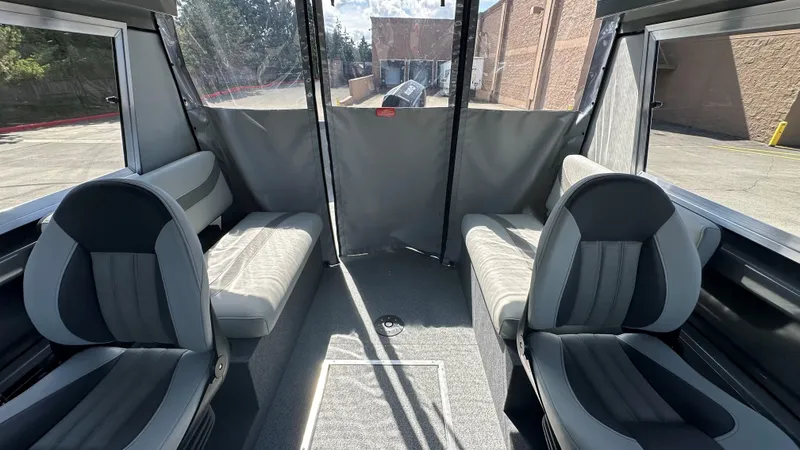 Slide: The Image of Interior of 2025 Spartan 215 Athens boat with modern seating and spacious layout. - 7