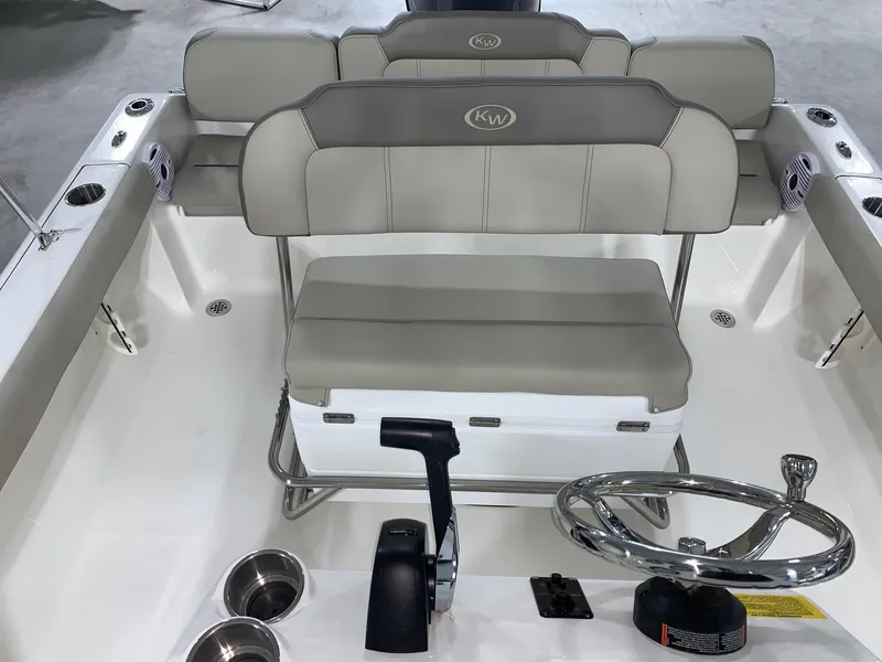 Slide: The Image of 2024 Key West 189 FS boat interior with dual seating and steering console. - 8