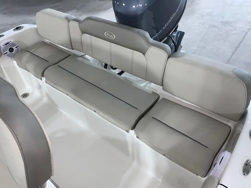 Slide: The Image of 2024 Key West 189 FS boat interior seating with cushioned backrest. - 9