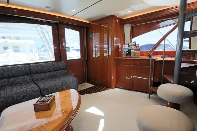 Slide: The Image of Luxurious interior of 2013 Viking 66 yacht with elegant wood finishes and modern furnishings. - 10