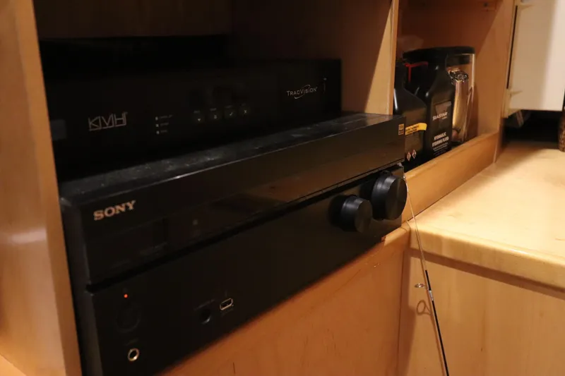 Slide: The Image of Audio equipment setup in a 2013 Viking 66 yacht interior. - 15