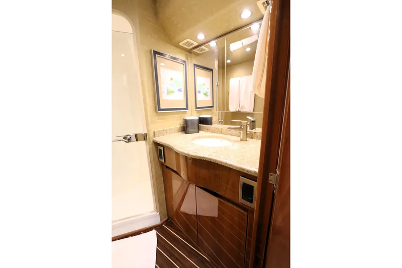 Slide: The Image of Luxurious bathroom in 2013 Viking 66 yacht with elegant fixtures and modern design. - 31