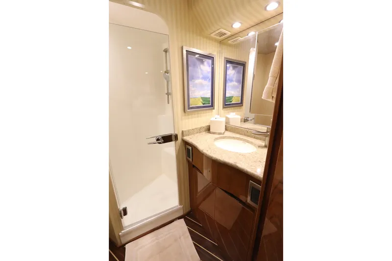 Slide: The Image of Luxurious bathroom in 2013 Viking 66 yacht with shower and elegant vanity. - 34