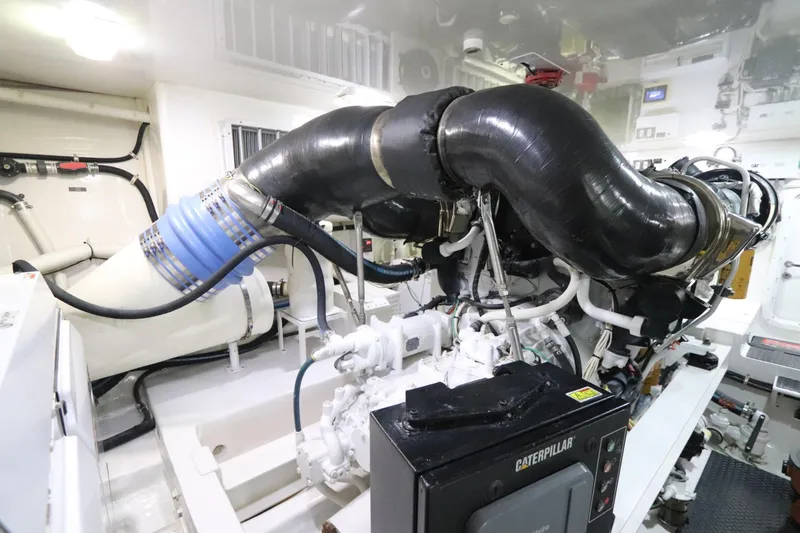Slide: The Image of Engine room of 2013 Viking 66 yacht with Caterpillar machinery. - 44