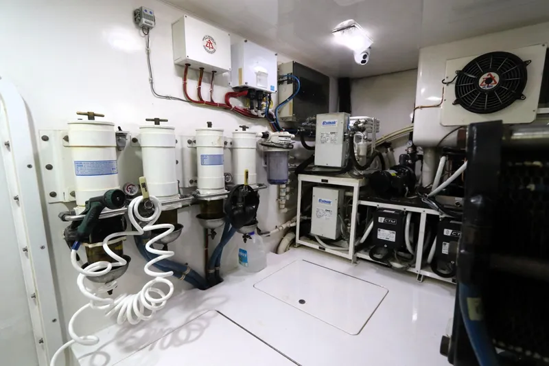 Slide: The Image of Engine room of 2013 Viking 66 yacht with filtration and cooling systems. - 47