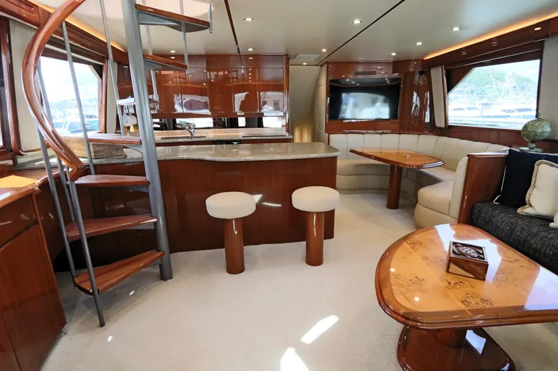 Slide: The Image of Luxurious interior of 2013 Viking 66 yacht with elegant wood finishes and modern amenities. - 6