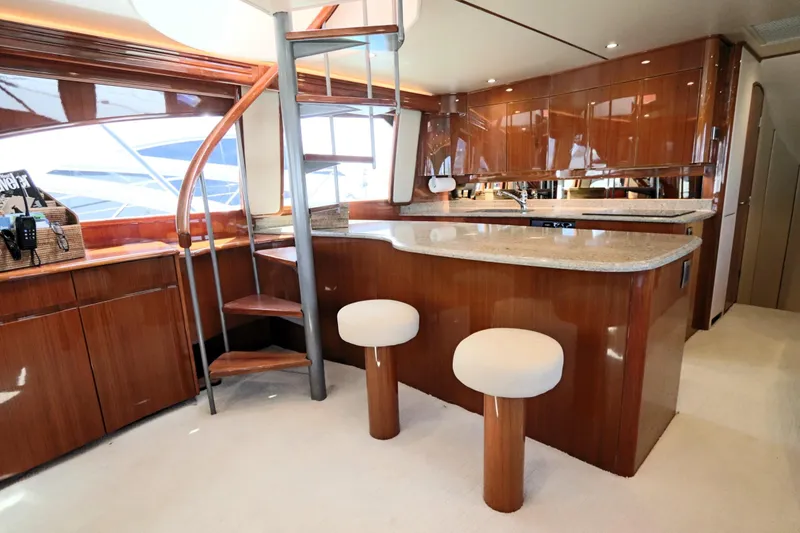 Slide: The Image of Luxurious interior of 2013 Viking 66 yacht with elegant wood finishes and modern design. - 9