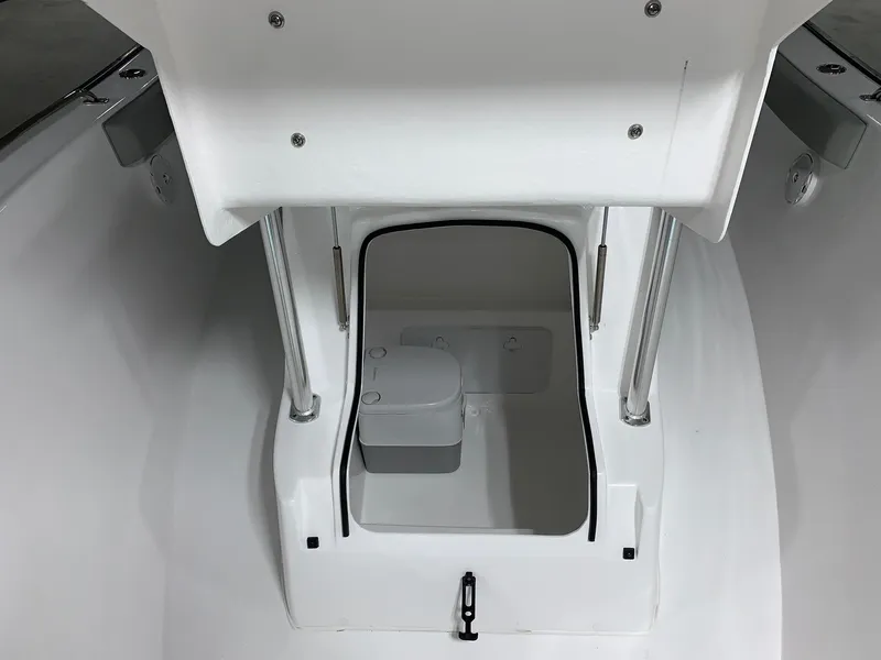 Slide: The Image of 2024 Cape Horn 22 OS boat interior with compact toilet. - 9