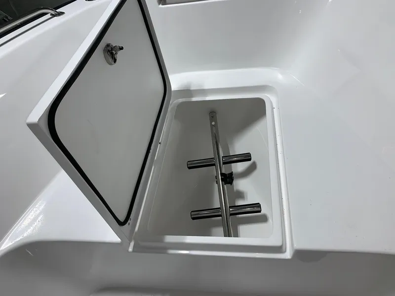 Slide: The Image of 2024 Cape Horn 22 OS storage compartment with open hatch. - 11