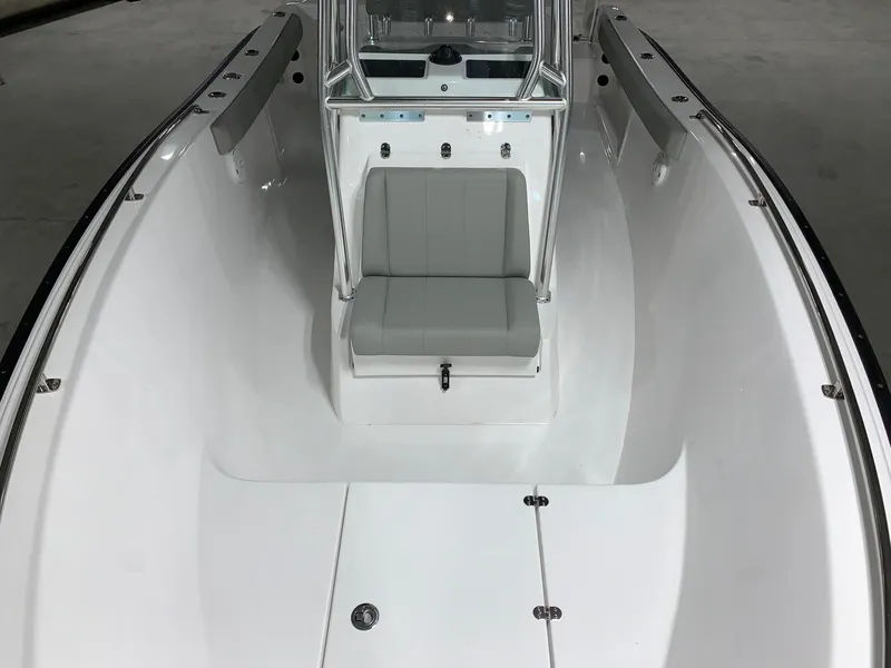 Slide: The Image of 2024 Cape Horn 22 OS boat interior with seating and console. - 12