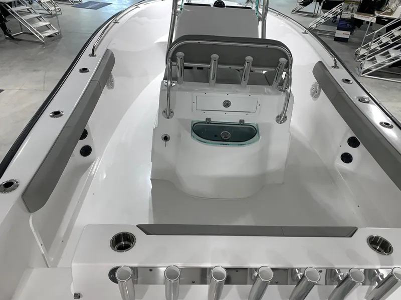 Slide: The Image of 2024 Cape Horn 22 OS boat interior with rod holders and seating. - 14