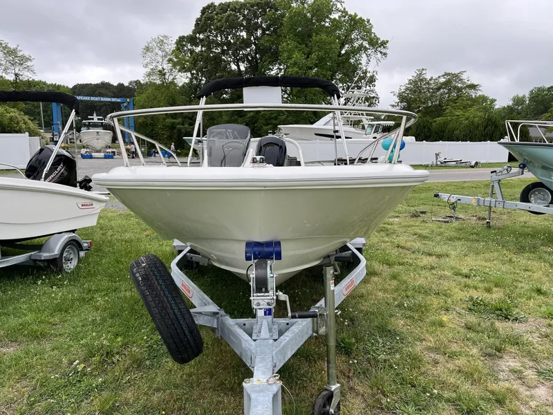 Slide: The Image of 2024 Boston Whaler 160 Super Sport boat on trailer, front view, outdoor display. - 17