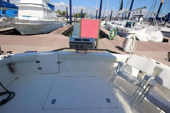 Slide: The Image of 2001 Silverton 42 Convertible yacht at dock, interior view. - 25