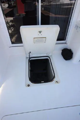 Slide: The Image of Open hatch on a 2001 Silverton 42 Convertible boat. - 27