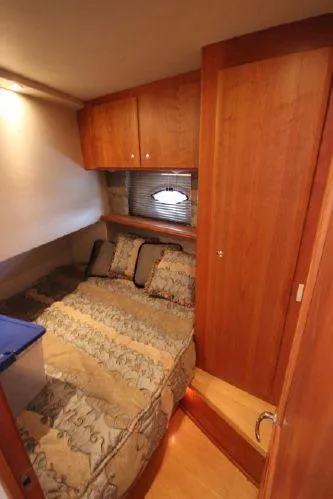 Slide: The Image of Interior of 2001 Silverton 42 Convertible with cozy bedroom. - 39