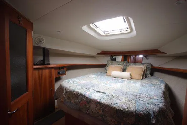 Slide: The Image of Interior of 2001 Silverton 42 Convertible with cozy bedroom. - 40