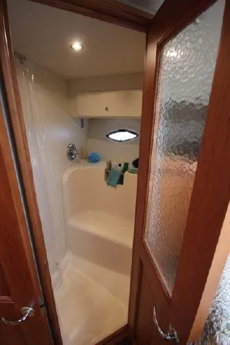 Slide: The Image of Bathroom in 2001 Silverton 42 Convertible boat. - 41