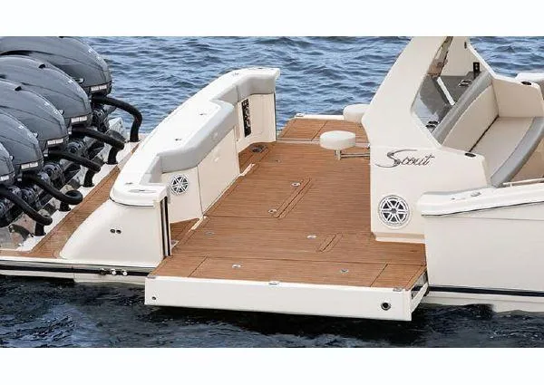 Slide: The Image of 2026 Scout 530 LXF with luxurious teak deck and powerful engines. - 5