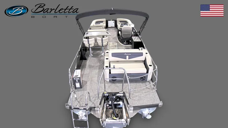 Slide: The Image of 2023 Barletta C24UE pontoon boat, spacious interior, luxury seating, gray background, American flag. - 3