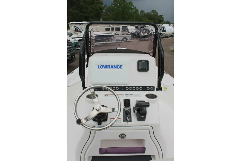 Slide: The Image of 2022 Blue Wave 2200 STL boat dashboard with Lowrance navigation system. - 11