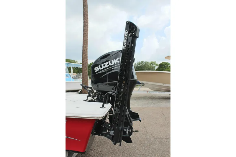 Slide: The Image of 2022 Blue Wave 2200 STL boat with Suzuki outboard motor and Raptor anchor system. - 9
