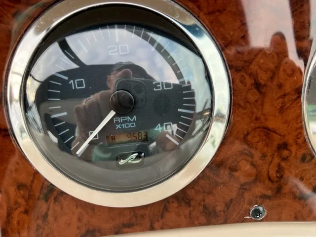 Slide: The Image of Close-up of RPM gauge on 2000 Sea Ray 460 Sundancer boat dashboard. - 22